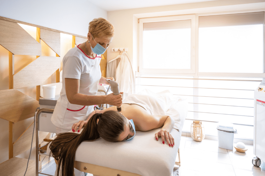 therapist performing Shockwave therapy in Hamilton & Stoney Creek