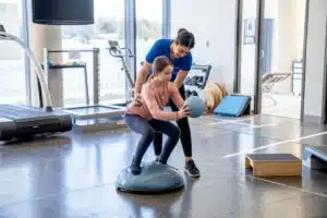 Physiotherapist performing vestibular physiotherapy